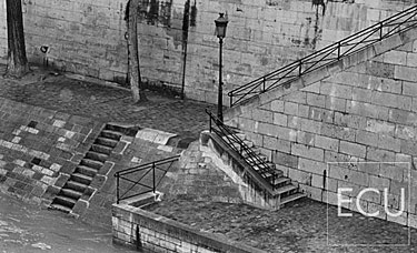 Black and white photo of the south side quay of the Ile St. Louis on the Seine in Paris, France